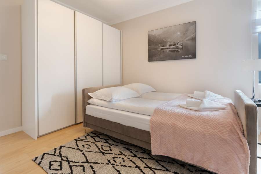 Sypialnia w apartamencie Altara Apartamenty